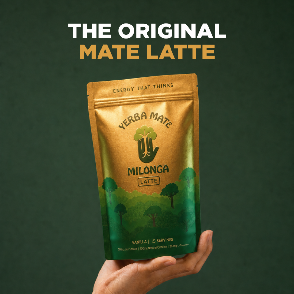 A hand holds a stand-up pouch of Yerba Mate Milonga Latte against a dark green background, with large text at the top reading 'THE ORIGINAL MATE LATTE'. The pouch is metallic gold at the top and green at the bottom, with a hand graphic and forest illustration.